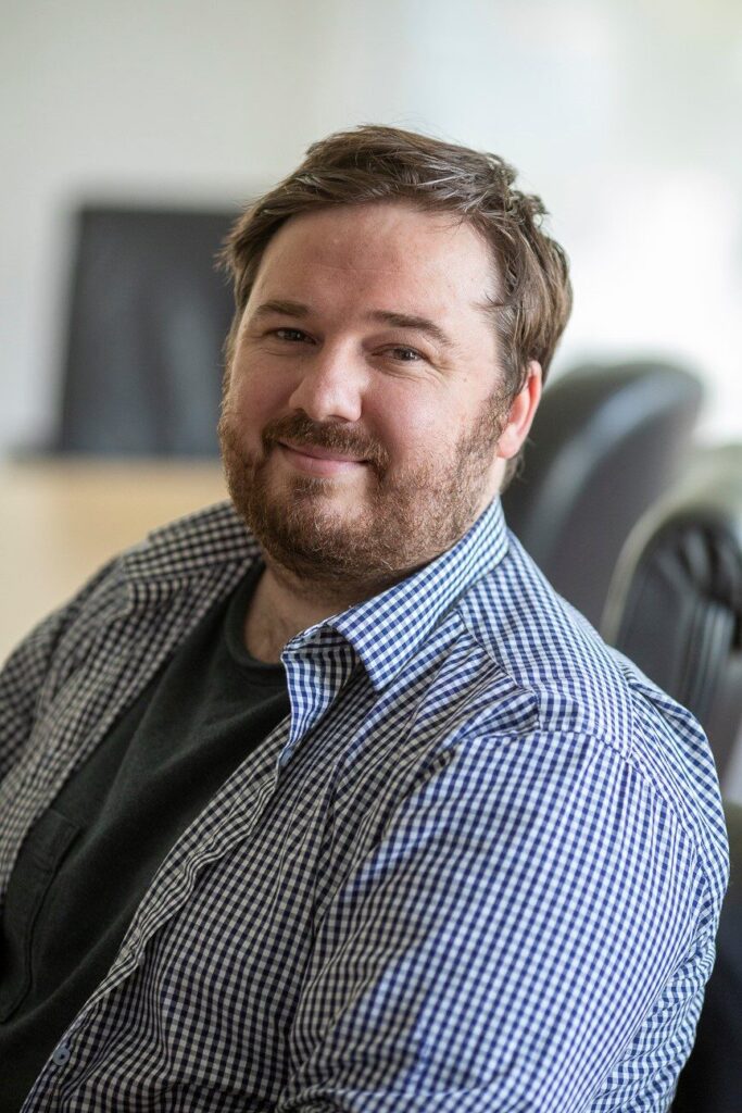 Headshot of Christopher Armstrong, PhD